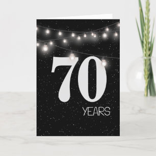 Carte 70e anniversaire avec lumières et étoiles