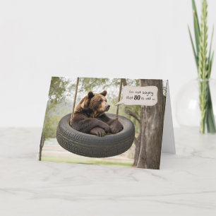 Carte 80e anniversaire Ours assis dans un pneu
