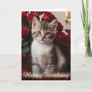 Carte Adorable Kitten Niché dans de belles roses rouges