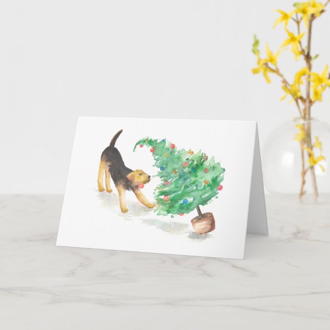 Carte Airedale tire le sapin de Noël (Fleur jaune)
