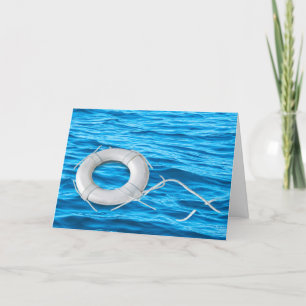 Carte anneau de Merci flottant dans l'eau