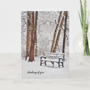Carte banc du parc d'hiver dans les flocons de neige