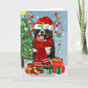 Carte Bernese Mountain Dog dans la neige avec des cadeau