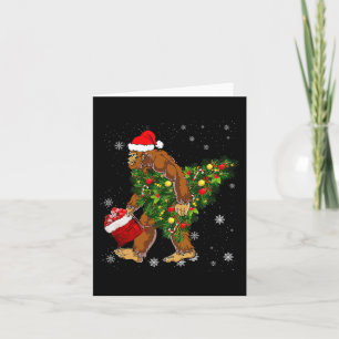 Carte Bigfoot portant un arbre de Noël, adepte de Sasqua