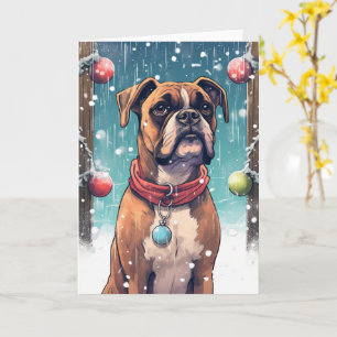 Carte Boxer jouant avec des boules de Noël dans la neige