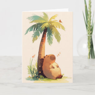 Carte Capybara faisant la sieste sous un palmier