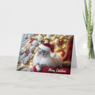 Carte Chat à poupée de Noël sur une chaise Vintage
