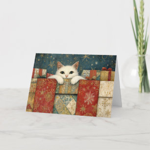 Carte Chat blanc regardant par-dessus les cadeaux de Noë