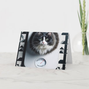 Carte Chat d'humour sur la perte de poids sur une balanc