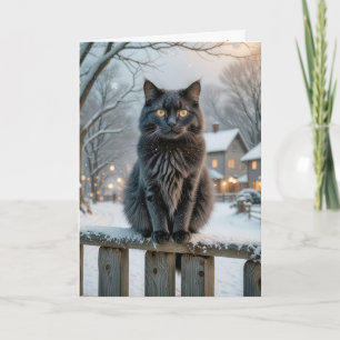 Carte Chat noir de Noël sur une clôture neigeuse