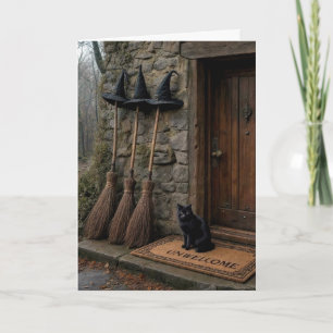 Carte Chat noir d'Halloween sur un paillasson importun