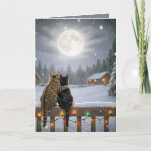 Carte Chats de Noël se blottissant sur une clôture ennei