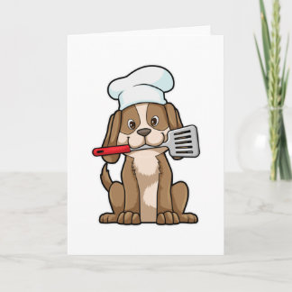 Carte Chien comme cuisinier avec toque et spatule