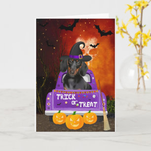 Carte Chien de Dachshund dans un camion Halloween