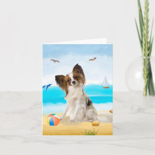 Carte Chien de Papillon sur la plage