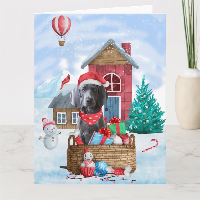 Carte Chien Weimaraner dans la maison de Noël enneigée (Devant)