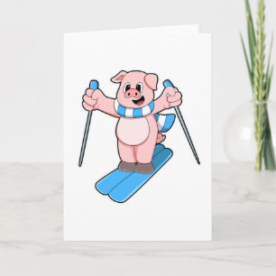 Carte Cochon en skieur avec écharpe de ski et bâtons de 