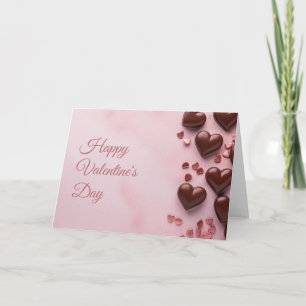 Carte Cœurs en chocolat sur fond rose Saint-Valentin