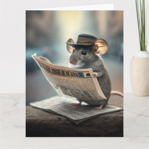 Carte compacte d'une souris lisant le journal
