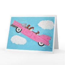 Dachshunds dans une décapotable rose dans le ciel