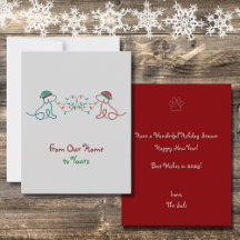 Chiens jouant avec la fête de Noël