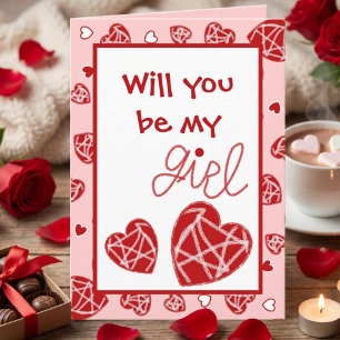 Carte de la Saint-Valentin aux cœurs rouges disper