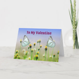 Carte de la Saint-Valentin avec deux papillons dan