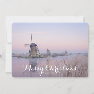 Carte de Noël avec moulins à vent en hiver