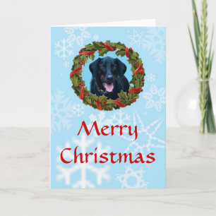 Carte de Noël Doberman noir avec couronne et neige