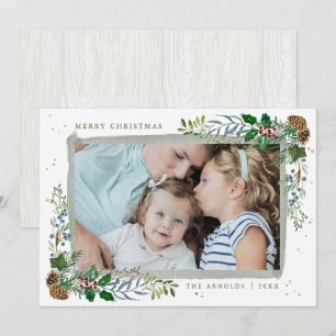 Carte de Noël encadrée par le bois À feuillage per