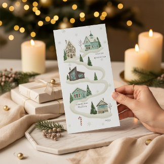 Carte de Noël hivernale avec un village enneigé