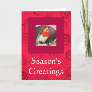 Carte de Noël rouge d'oiseau de vacances