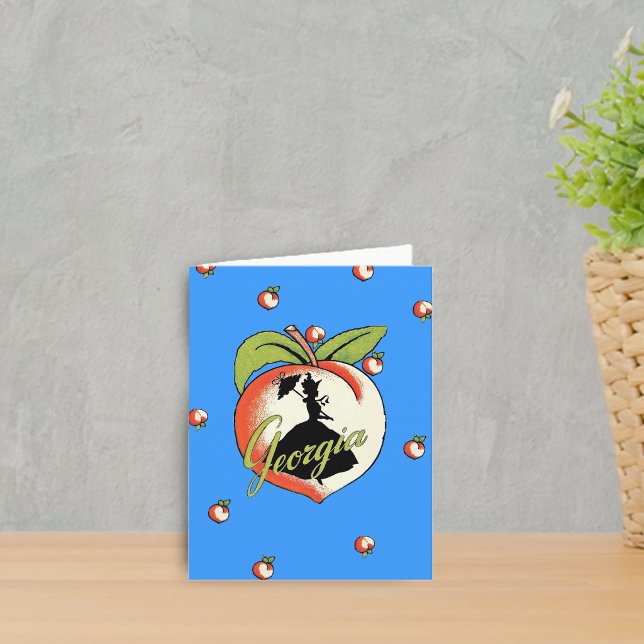 Carte de note pêche de Géorgie (Silhouette Southern Belle hoop skirt on big Georgia peach on vibrant blue notecards.)