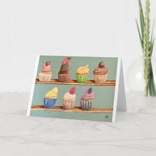 Carte de note sur le plateau de cupcake