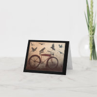 Crows se rassemblent sur un vélo rouge vintage