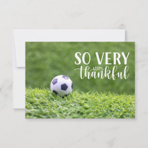 Carte De Remerciements Les balles de football sont sur l'herbe verte