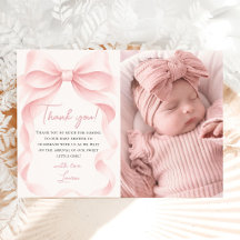 Photo de bébé fille au noeud rose