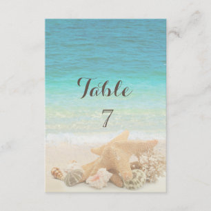 Carte de table de coquillages de mariage de plage