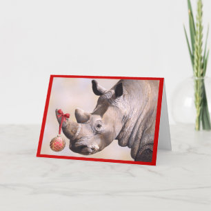 Carte de vacances de rhinocéros et d'ornement
