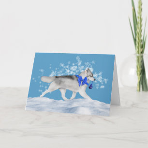 Carte de vacances d'hiver de chien de traîneau