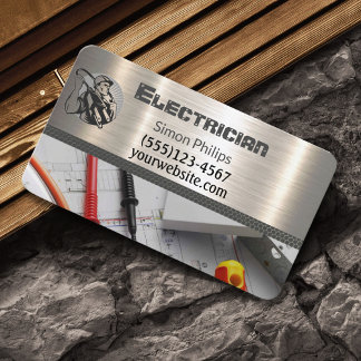 Carte de visite d'électricien de main de métal