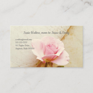 Carte De Visite Rose sur les pages de livres vintages