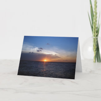 Carte de voeux de coucher du soleil d'océan
