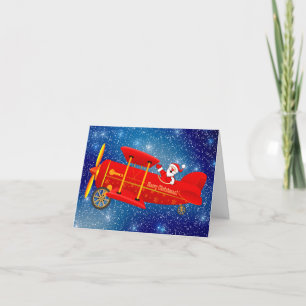 Carte de voeux de Noël père Noël Flying Biplane