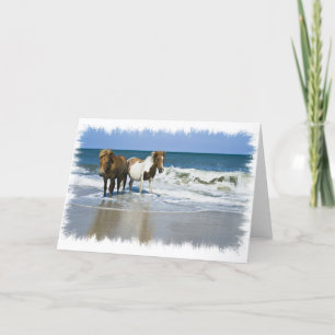 Carte de voeux de plage de cheval