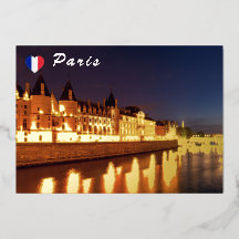 Conciergerie illuminée la nuit - Paris, France