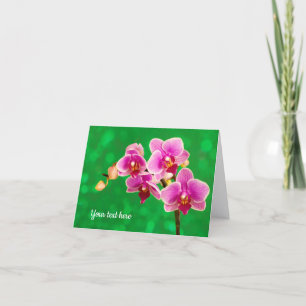 Carte de vœux orchidée violette sur fond vert