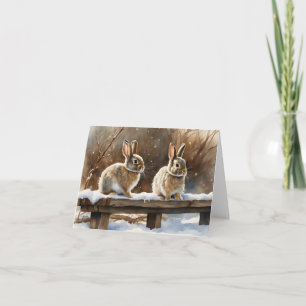 Carte Deux mignons lapins de lapin sur un banc en blanc 