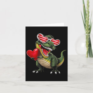Carte Dinosaure Trex tenant un cœur portant des lunettes