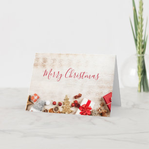 Carte Éléments sur le thème de Noël sur une planche en b